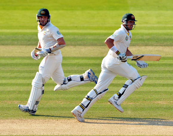 Ryan Harris (left) and James Pattinson of Australia run between the wickets