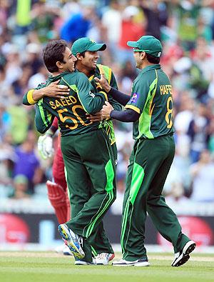 Saeed Ajmal of Pakistan celebrates taking the wicket of Chris Gayle of West Indies during the ICC Champions Trophy group at The Oval on Friday