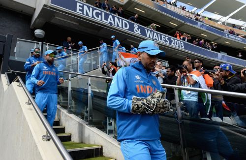 India captain MS Dhoni leads out his team ahead the ICC Champions Trophy match between India and Pakiatan at Edgbaston
