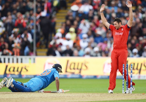 Tim Bresnan of England celebrates the run out
