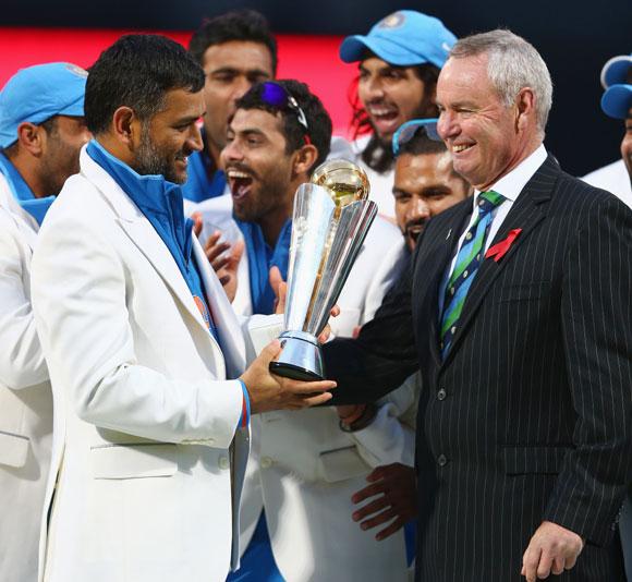 India captain MS Dhoni receives the winners trophy