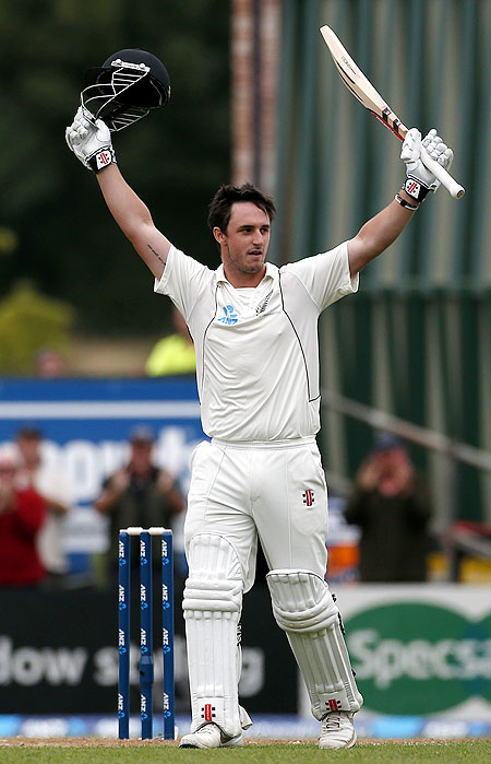 Hamish Rutherford celebrates after scoring his debut century against England on Friday