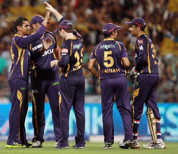 Sunil Narine is congratulated by his teammates