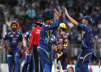 Mumbai Indians players celebrate after victory over Kolkata Knight Riders