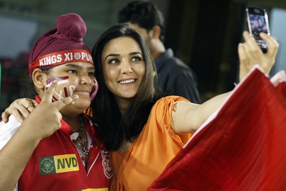 Preity Zinta, the co-owner of Kings XI Punjab with a fan