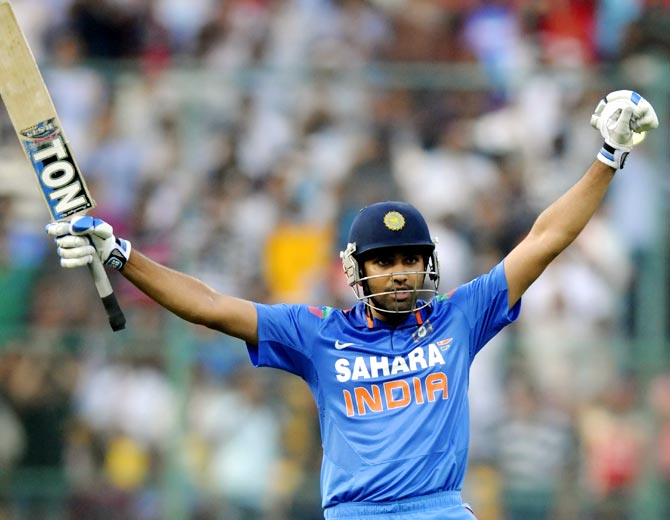 Rohit Sharma celebrates after reaching his century
