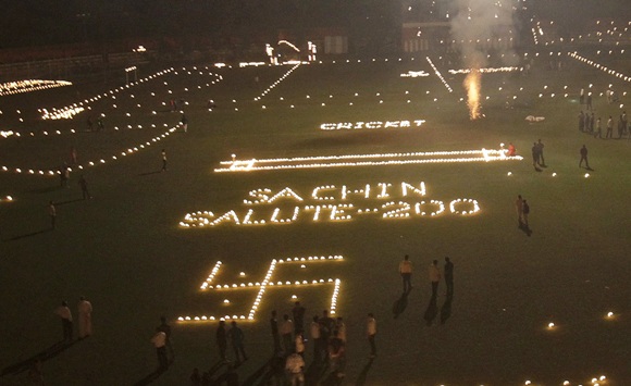 Candles spelling out a message about Indian cricketer Sachin Tendulkar