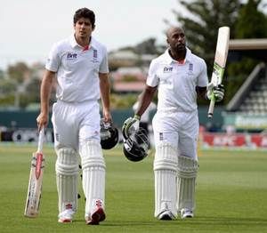 England captain Alastair Cook and Michael Carberry leave the field at the end of the day's play