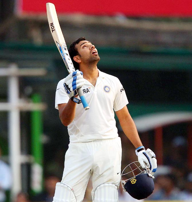 Rohit Sharma celebrates after getting to his hundred at the Eden Gardens