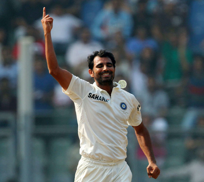 Mohammed Shami celebrates the wicket of Chris Gayle of West Indies