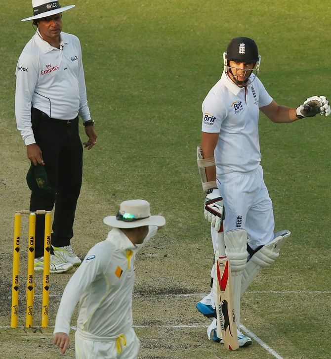James Anderson and Michael Clarke take part in a furious exchange which involved both the umpires during the first Ashes Test in 2013