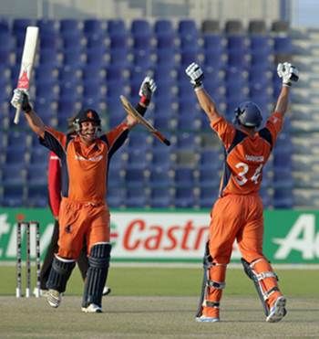 Michael Swart (left) and Wesley Barresi of the Netherlands celebrate after defeating Scotland