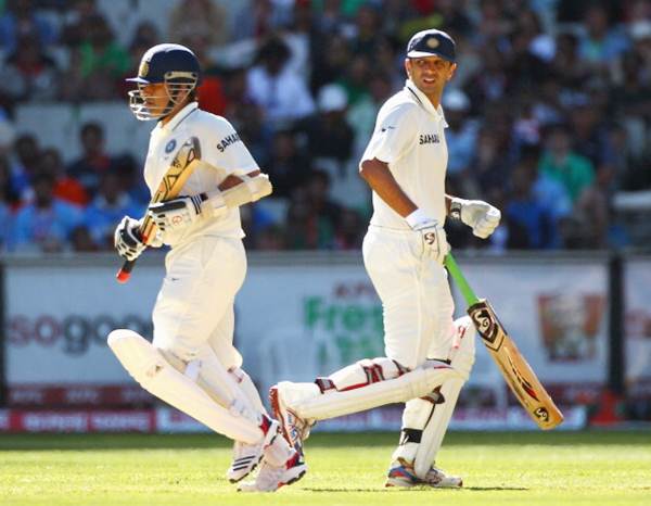 Rahul Dravid and Sachin Tendulkar run between the wickets during Day 2 of the first Test between Australia and India at Melbourne Cricket Ground on December 27, 2011