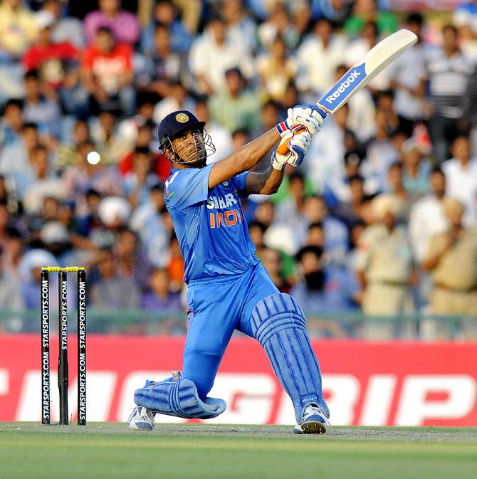 Mahendra Singh Dhoni hits a six