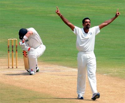 Dhawal Kulkarni celebrates the wicket of Neil Broom
