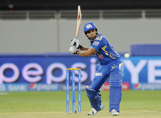 Mumbai Indians captain Rohit Sharma hits a shot