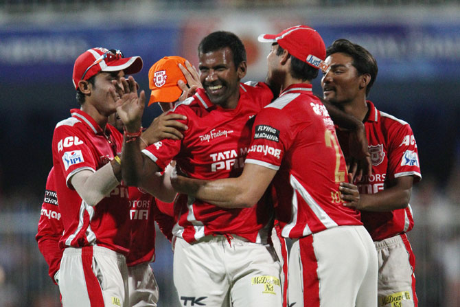 Lakshmipathy Balaji celebrates with his Kings XI Punjab teammates