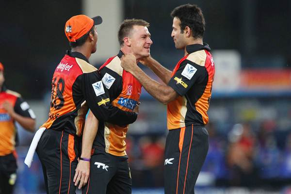 Dale Steyn is congratulated by Irfan Pathan after dismissing Corey Anderson