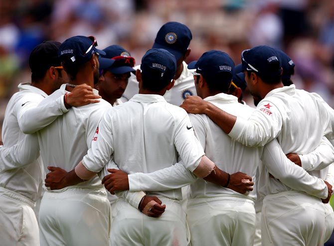 Team India in a huddle