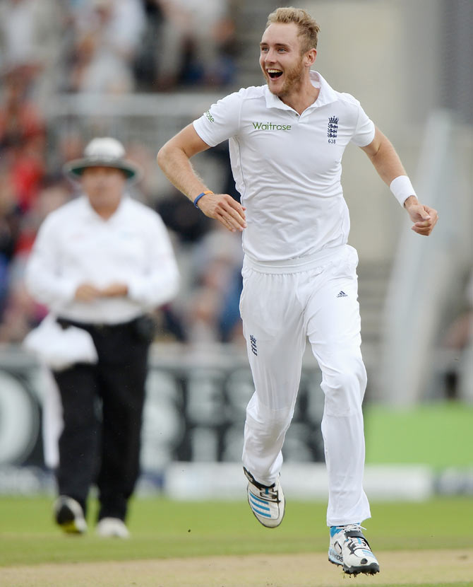Stuart Broad of England celebrates dismissing Cheteshwar Pujara of India in the 4th Test at Old Trafford on Thursday