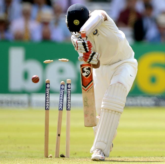 Cheteshwar Pujara of India is bowled by Ben Stokes of England during the second Test