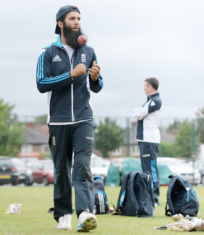 Moeen Ali of England prepares bowl during a nets session 