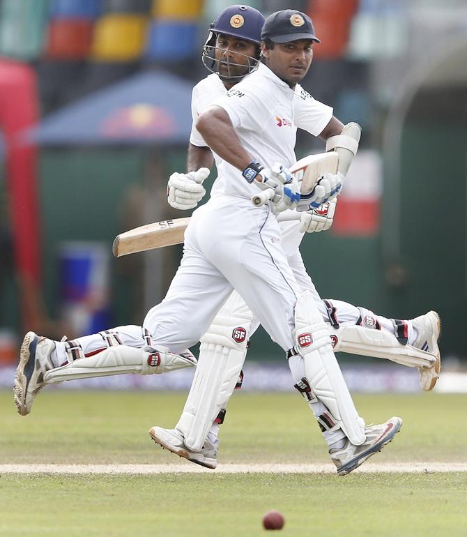 Sri Lanka's Mahela Jayawardene, left, and Kumar Sangakkara celebrate their partnership