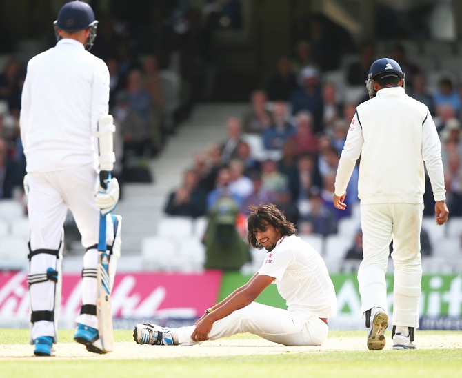 Ishant Sharma of India looks on after taking the wicket of Stuart Broad of England