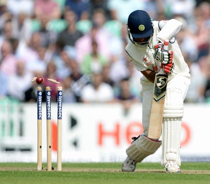 Cheteshwar Pujara of India is bowled by Stuart Broad 