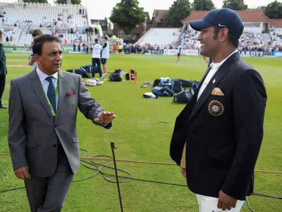 Sunil Gavaskar, left, and Mahendra Singh Dhoni