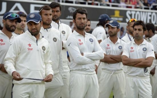 India's players wear a dejected look after the fifth Test in England