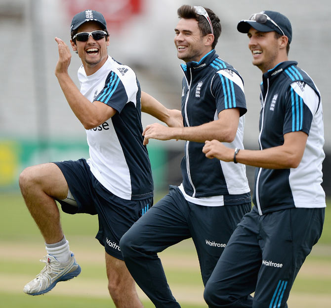 England captain Alastair Cook shares a joke with James Anderson and Steven Finn during a nets session