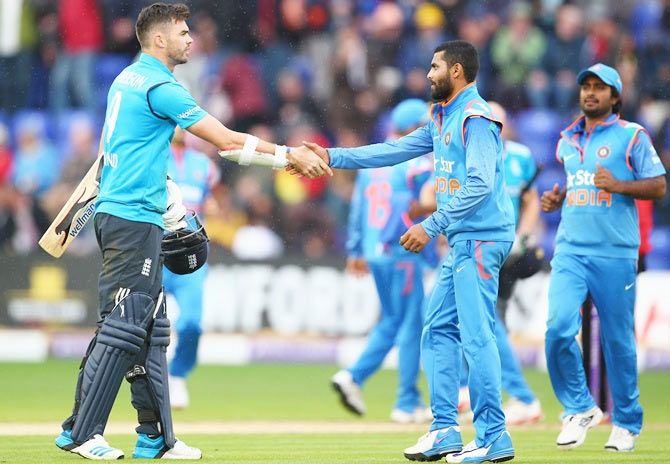 James Anderson, left, of England shakes hands with Ravindra Jadeja of India after India's 133 run victory
