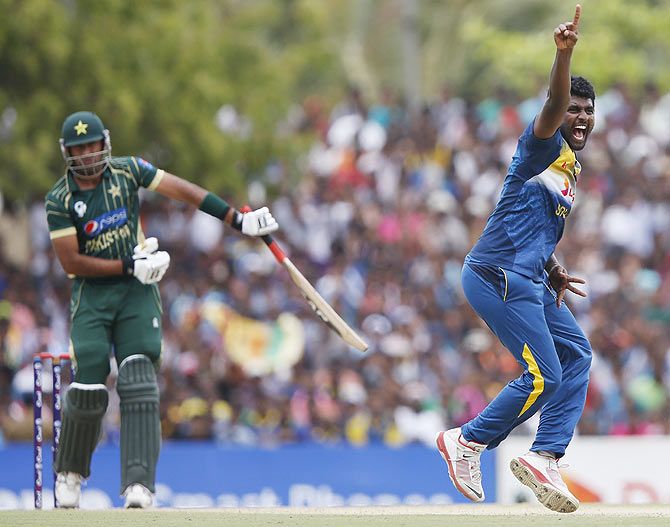 Sri Lanka's Thisara Perera (right) appeals successfully for the wicket of Pakistan's Wahab Riaz during their final ODI (One Day International) in Dambulla on Saturday