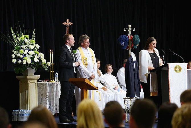 Megan Hughes, sister of Phillip Hughes, reads out her eulogy during the funeral service