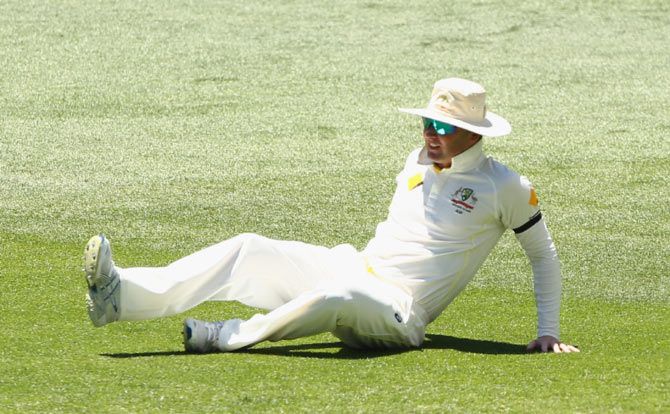 Australia captain Michael Clarke reacts after getting injured