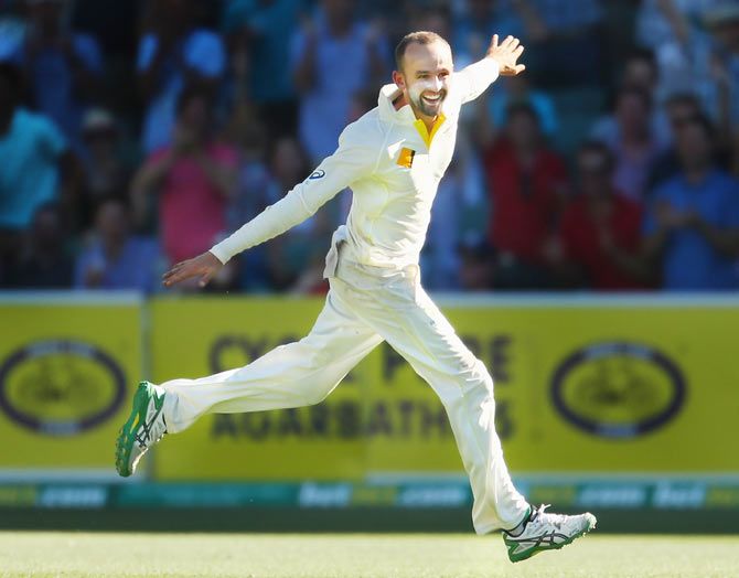 Nathan Lyon celebrates after taking the wicket of Ishant Sharma to win the match on Day 5 of the first Test at the Adelaide Oval on Saturday