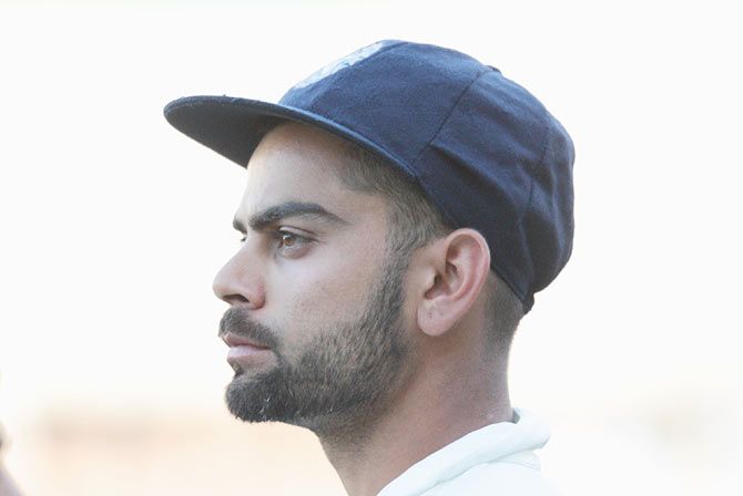 Virat Kohli wears a pensive look after the first Test at the Adelaide Oval on Saturday