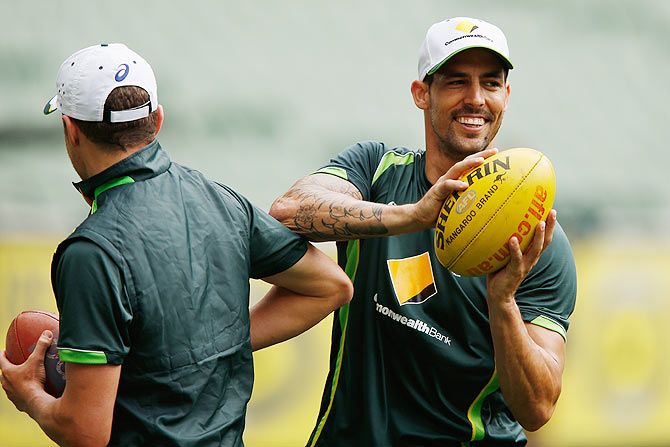 Peter Siddle and Mitchell Johnson enjoy an Australian training session at Melbourne Cricket Ground on Tuesday