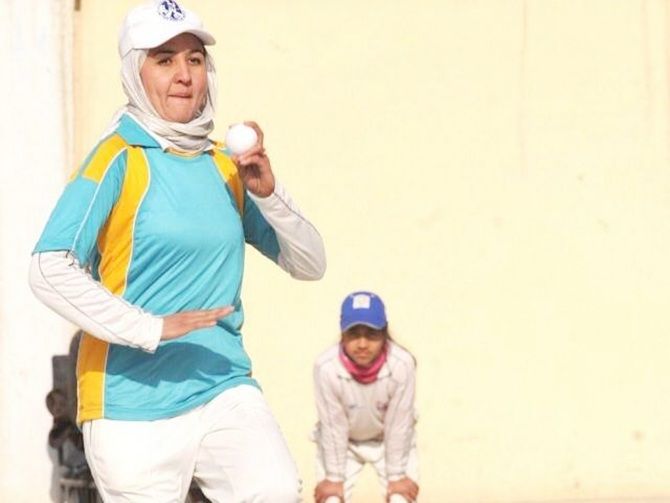 Afghan woman bowls