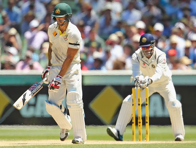 Mitchell Johnson of Australia is dismissed stumped by MS Dhoni of India on Saturday