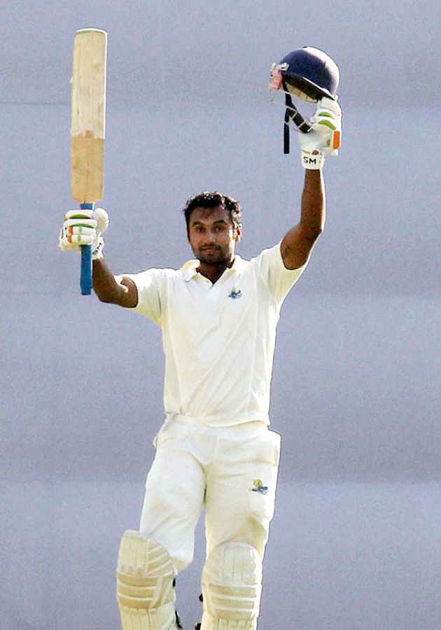 Himachal Pradesh batsman Paras Dogra celebrates his double century during the 2nd day of the Ranji Trophy match against Assam, in Guwahati on Monday