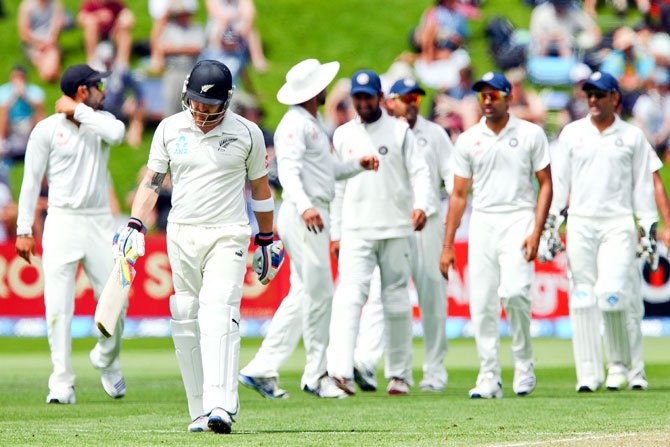 Brendon McCullum of New Zealand leaves the field after being dismissed