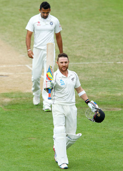 Brendon McCullum celebrates after becoming New Zealand's first triple centurion