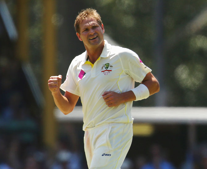 Ryan Harris of Australia celebrates after taking the wicket of Scott Borthwick of England
