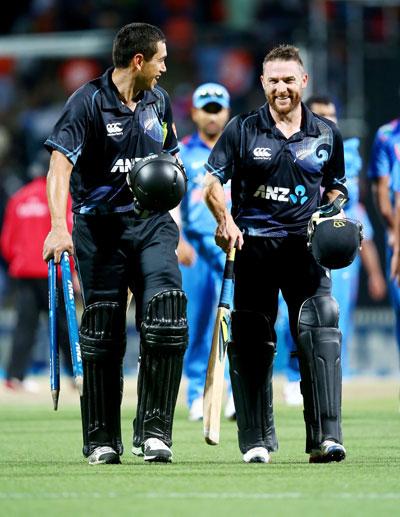 Ross Taylor (left) and Brendon McCullum of New Zealand leave the field following the game at Seddon Park