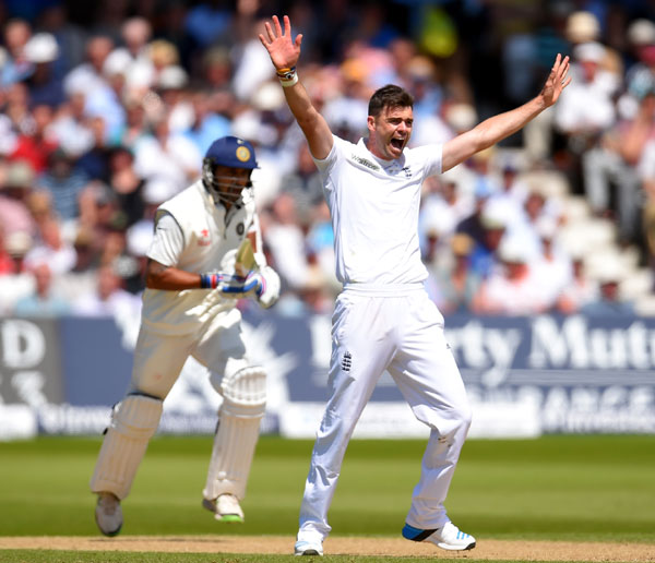 England bowler James Anderson celebrates after trapping India's Murali Vijay (left) lbw