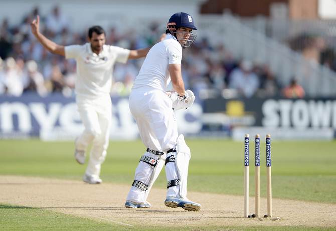 India pacer Mohammad Shami celebrates after bowling England captain Alastair Cook
