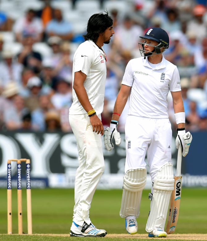 Ishant Sharma (left) exchanges a few words with Joe Root