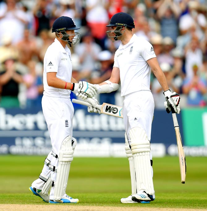 Joe Root (left) with James Anderson